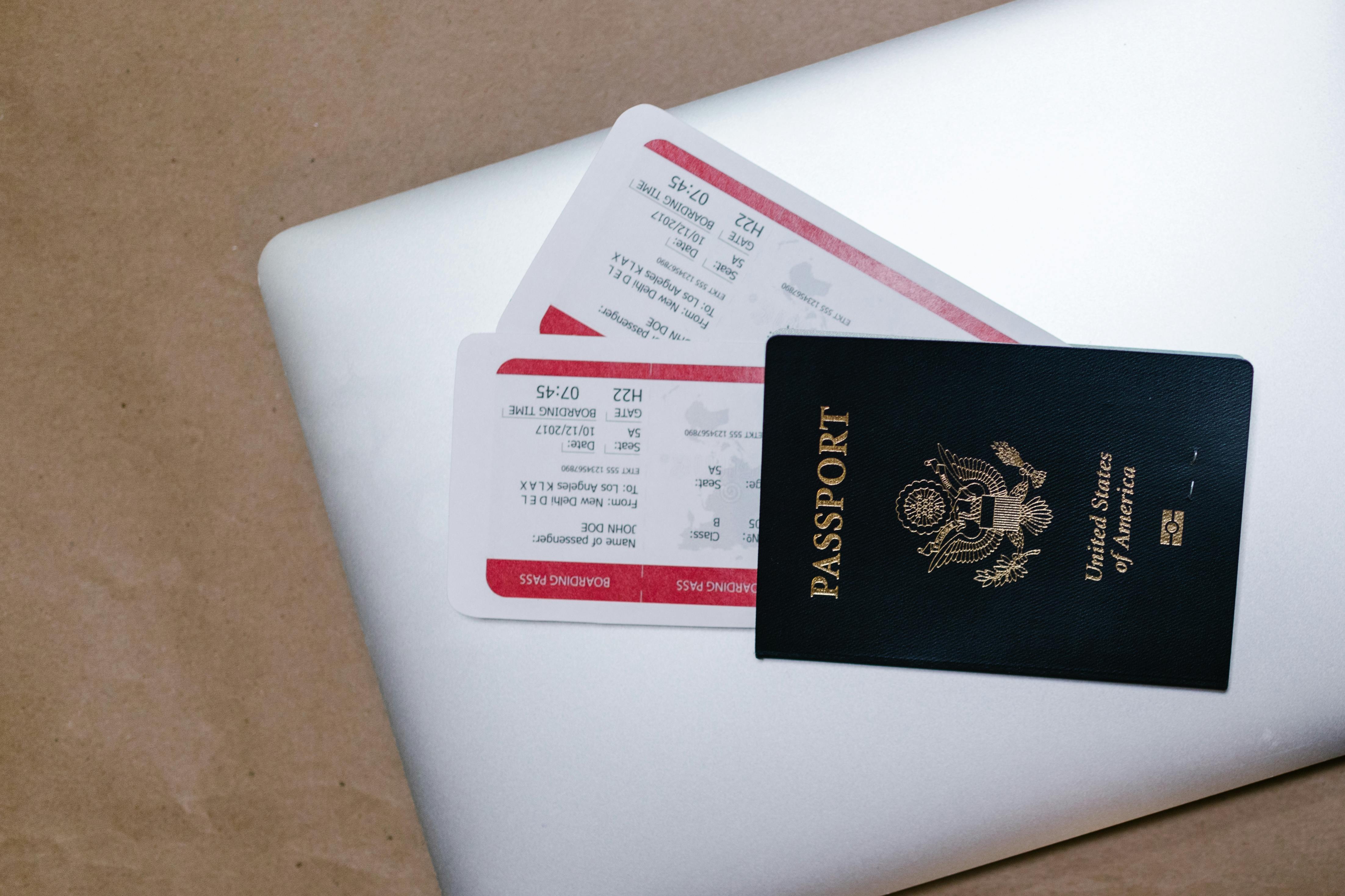 Passport and travel documents arranged on a desk for general litigation and immigration matters